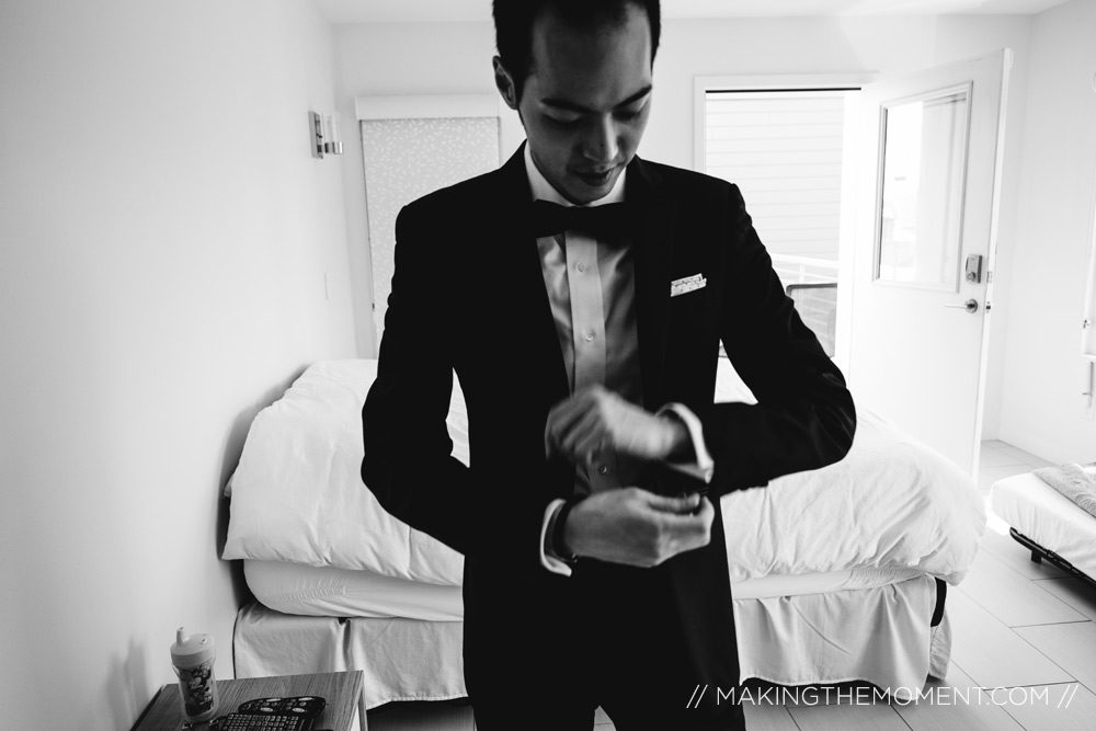 groom dressing candid wedding photography